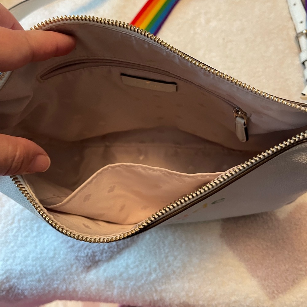 Kate spade purse with two straps and wallet.